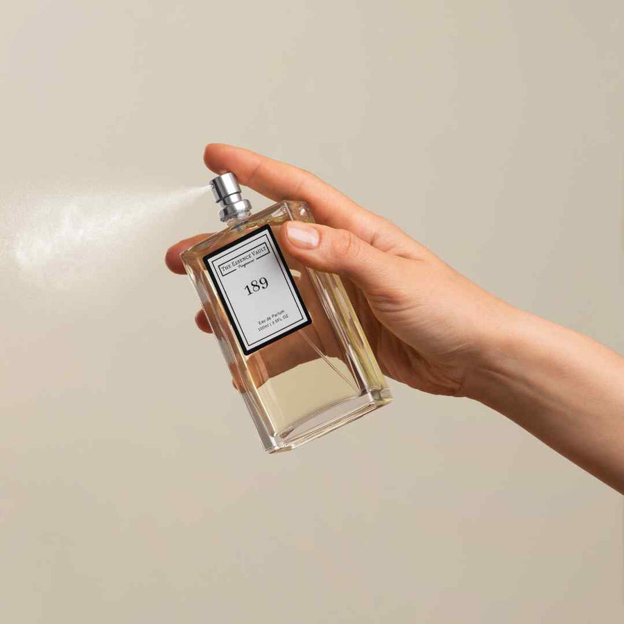 Image of a perfume bottle from The Essence Vault being sprayed, for the blog post What Are the Best Women's Perfumes?